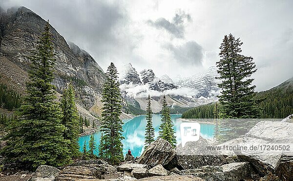 Cloudy mountain peaks  turquoise glacial lake  Moraine Lake  Valley of the Ten Peaks  Rocky Mountains  Banff National Park  Alberta Province  Canada  North America