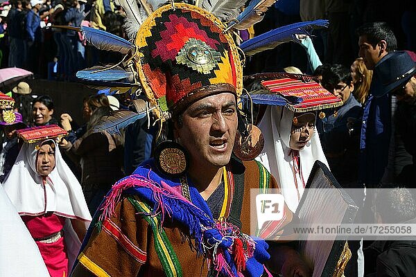 Inti Raymi  festival of the sun  Inca priest with feather decoration during a parade through the old town  Cusco  Peru  South America