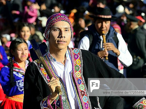 Portrait of an indigenous man in traditional traditional costume during a parade on the eve of Inti Raymi  festival of the sun