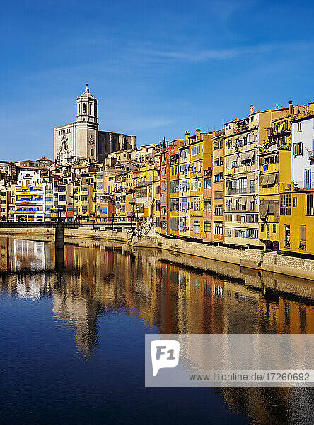 Colourful houses and the Cathedral reflecting in the Onyar River  Girona (Gerona)  Catalonia  Spain  Europe
