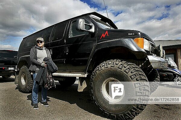 Super-size car  vehicle modified for highlands  woman  Gullfoss  Golden Circle  Iceland