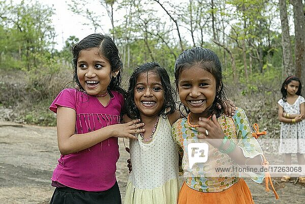 Girls watching Anthimahakallai Kavu festival in Cheelakkarai near Thrissur  Kerala  India  Asia