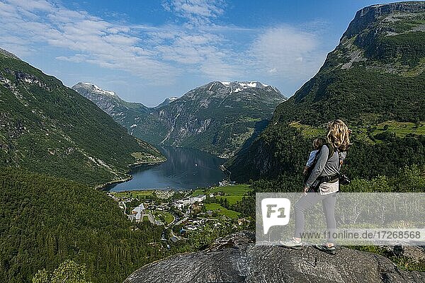 Mother with child overlooking Geirangerfjord  Sunmore  Norway  Europe