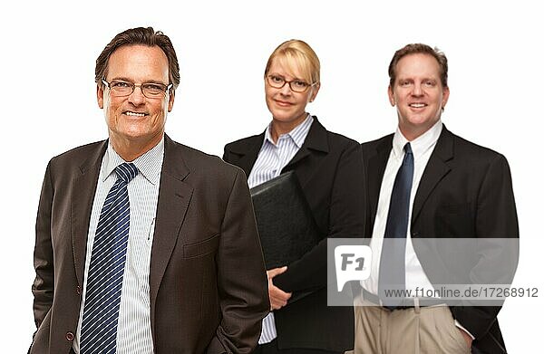Handsome businessman with team smiling in suit and tie isolated on a white background