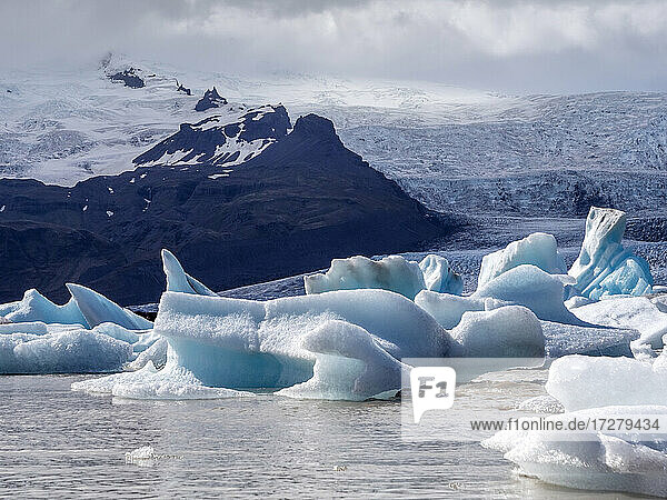 Icebergs floating in Jokulsarlon lake situated at head of Breidamerkurjokull glacier