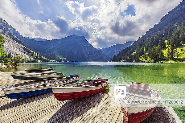 Rowboats left at edge of jetty on shore of Vilsalpsee lake