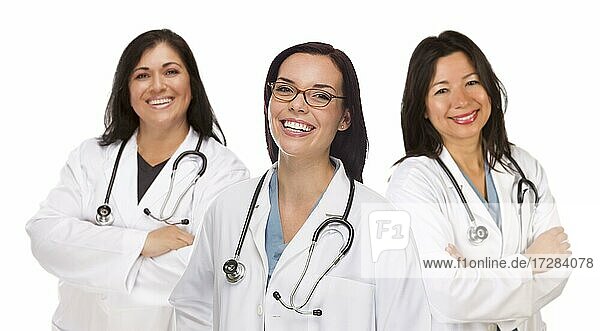 Three hispanic and mixed-race female doctors or nurses isolated on a white background