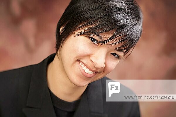 Smiling attractive ethnic girl poses for her portrait