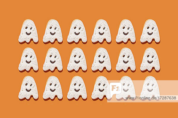 Studio shot of ghost-shaped Halloween cookies