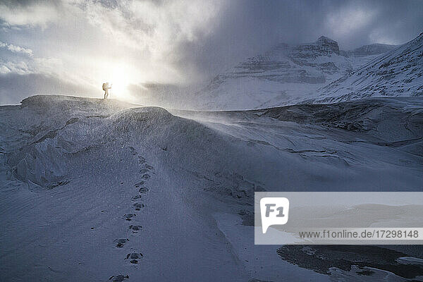 Mountaineering In Deep Winter Freeze On Frozen Glacier