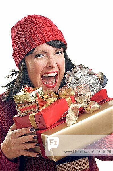 Attractive woman holds holiday gifts isolated on a white background