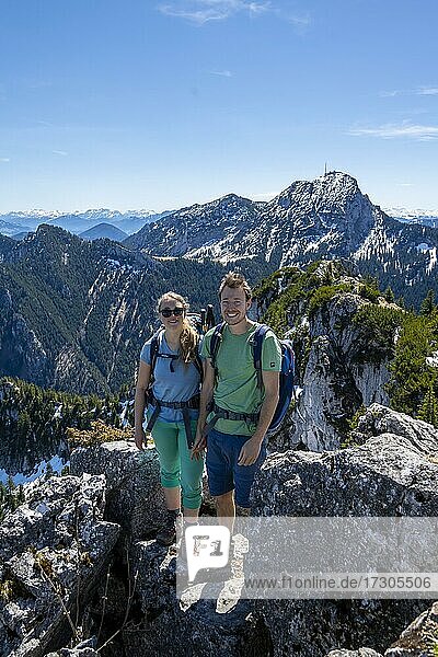 Two hikers on the summit of Breitenstein  behind Wendelstein  Fischbachau  Bavaria  Germany  Europe