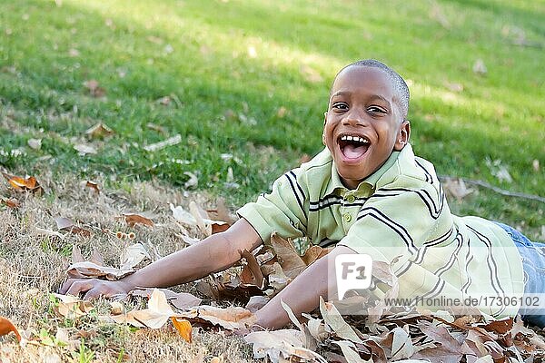 Young african american boy having fun in the park