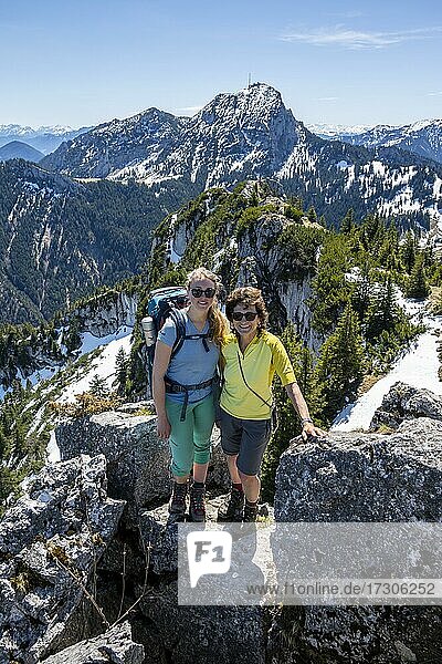 Two female hikers on the summit of Breitenstein  behind Wendelstein  Fischbachau  Bavaria  Germany  Europe