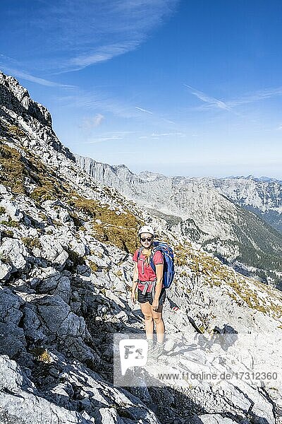 Hiker on the ascent  hiking trail to the Watzmann  Watzmann crossing  Berchtesgaden  Bavaria  Germany  Europe