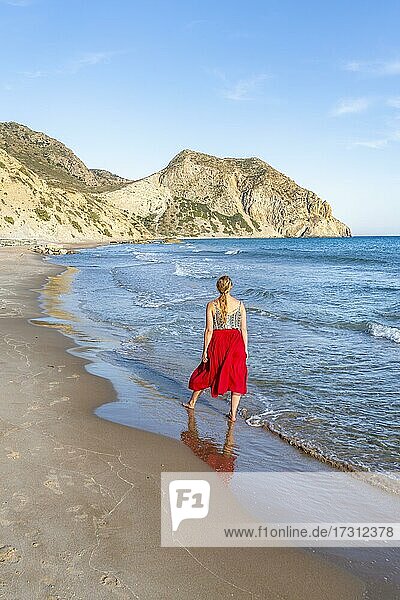 Young woman on the beach  coast at Paradise Beach  beach and turquoise sea  Kos  Dodecanese  Greece  Europe