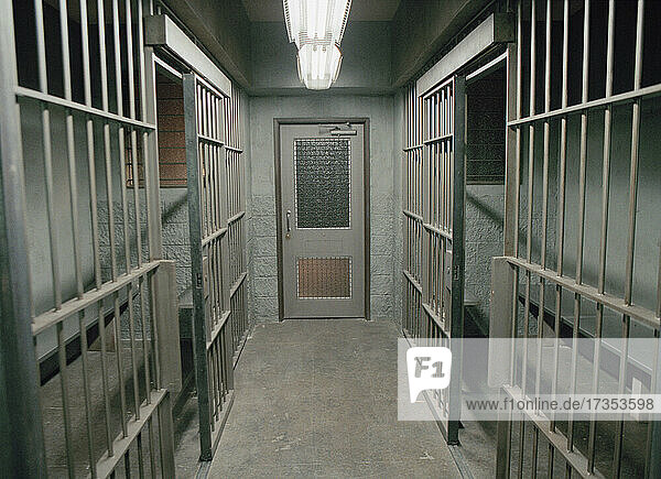 Row of empty prison cells
