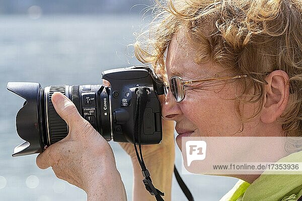 Woman photographing  Lake Maggiore  Piedmont  Italy  Europe