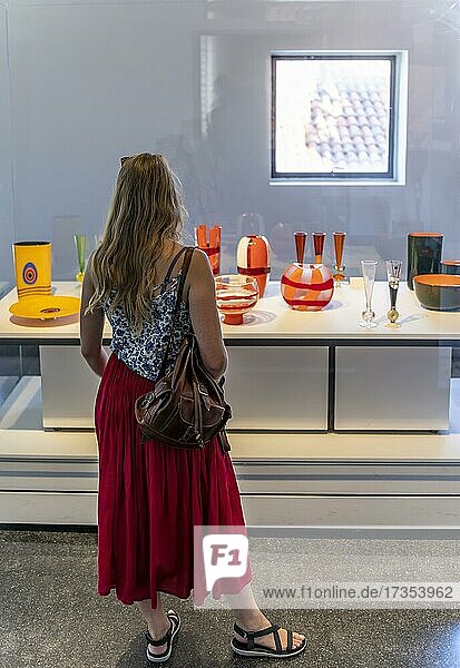 Young woman in the glass museum looking at hand-blown glass  Museo del Vetro  Murano  Venice  Veneto  Italy  Europe