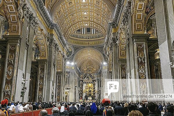 Pope celebrates Saint Mass in St Peter's Basilica in front of faithful Christians  Saint Father  St Peter's Basilica  Basilica di San Pietro  Vatican  Rome  Lazio  Italy  Europe