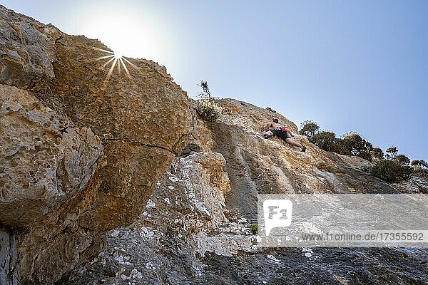 Climbing on a rock face  lead climbing  sport climbing  Kalymnos  Dodecanese  Greece  Europe