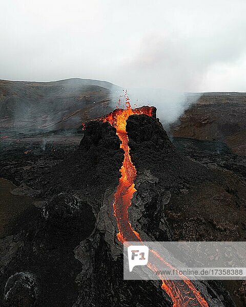 Aerial view  erupting volcano  crater with erupting lava and lava flow  Fagradalsfjall  Reykjanes Peninsula  Iceland  Europe