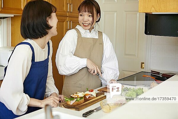 Japanese friends cooking at home