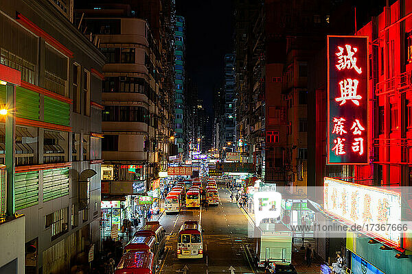 View of traffic moving on street at night  Hong Kong