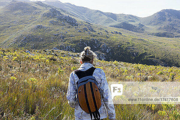 Family hiking a nature trail  Phillipskop nature reserve  Stanford  South Africa.