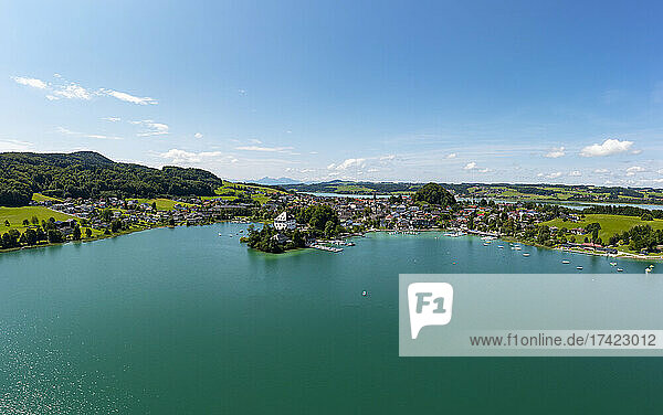 Austria  Salzburg  Mattsee  Drone view of lakeshore town in summer