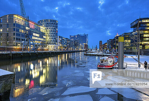 Germany  Hamburg  Ice floating in HafenCity canal at early dawn