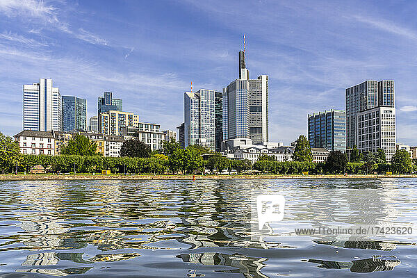 Germany  Hesse  Frankfurt  Clear surface of Main river with city skyline in background