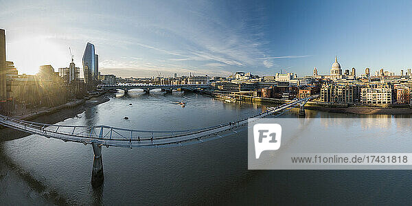 UK  London  High angle view of Millennium Bridge over River Thames at sunset