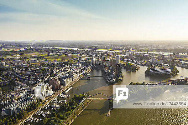 Germany  North Rhine-Westphalia  Dusseldorf  Aerial view of Media Harbour area at sunset