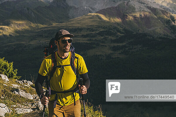 Man with a backpack hiking the Pyrenees mountains  Spain