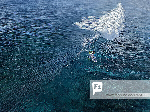 Aerial view of surfer in an ocean