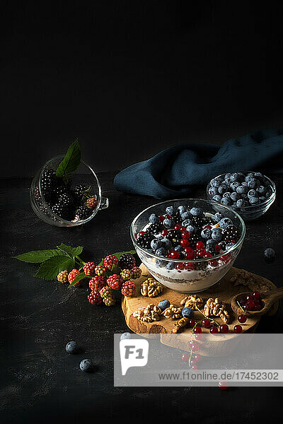 Chia pudding with nuts and berries: blueberries  currants and bl
