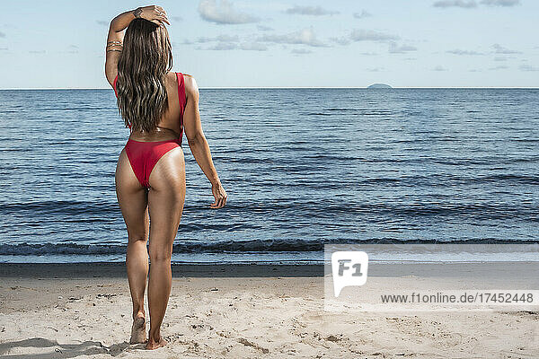 Beautiful woman enjoying her vacation on the beach in Pattaya