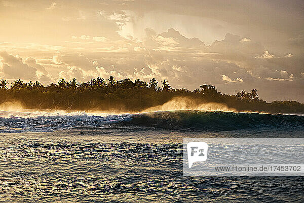 Ocean wave at sunset time  Maldives