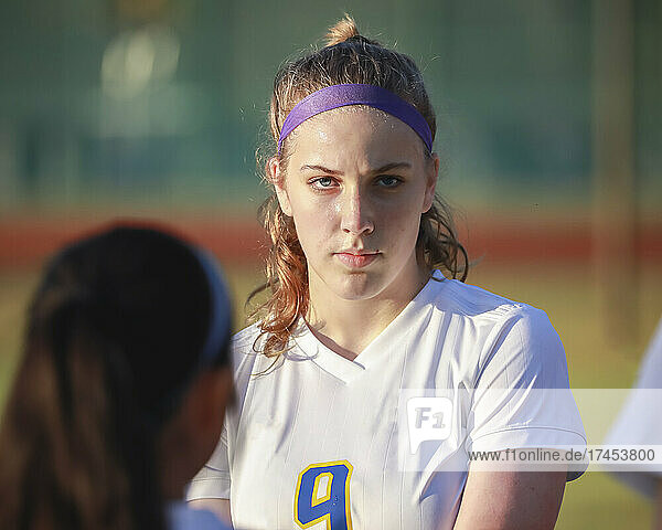 High school girl soccer player with serious game face expression