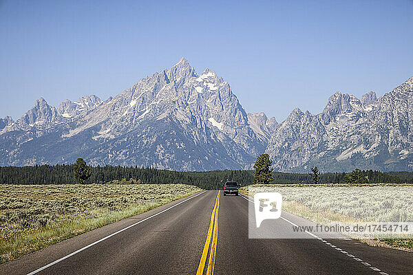 Summer highway views on a road trip in Grand Teton National Park.