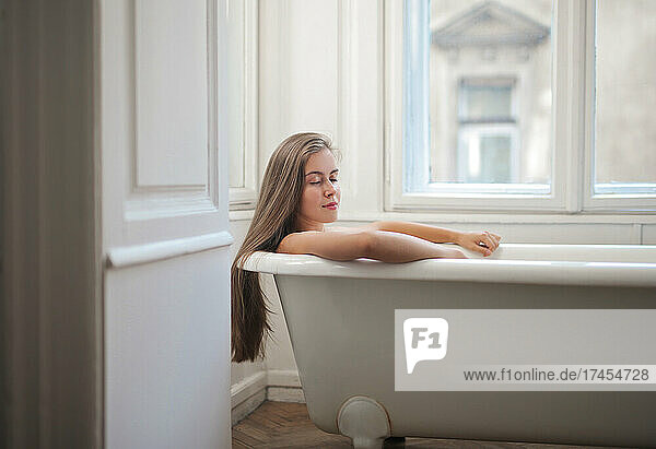 young woman in the bath tub