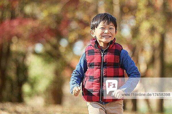 Japanese kid at campsite