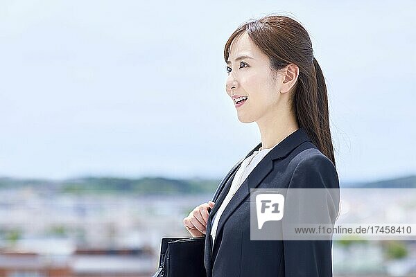 Japanese businesswoman portrait outdoors