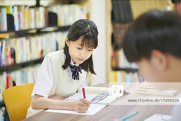 Japanese school students in the library