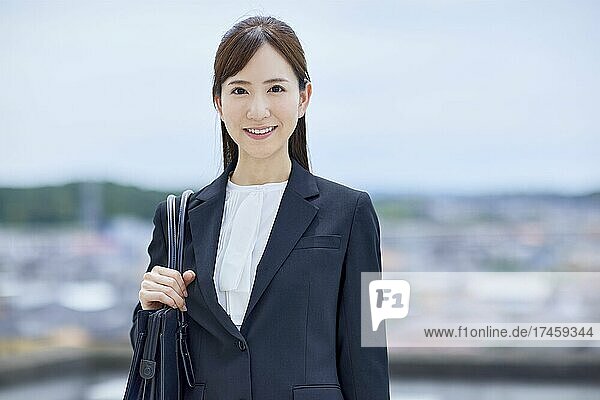 Japanese businesswoman portrait outdoors