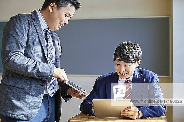 Japanese school students having lesson in the classroom