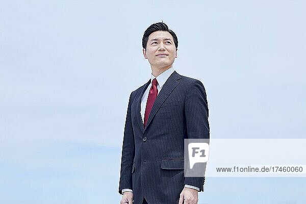 Japanese businessman portrait outdoors