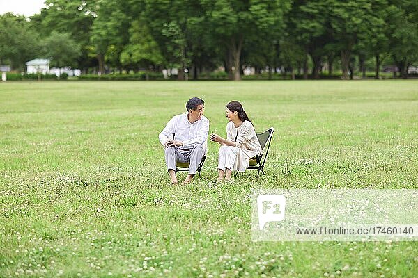 Japanese senior couple at a city park
