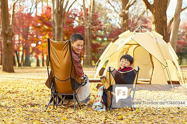 Japanese family at campsite